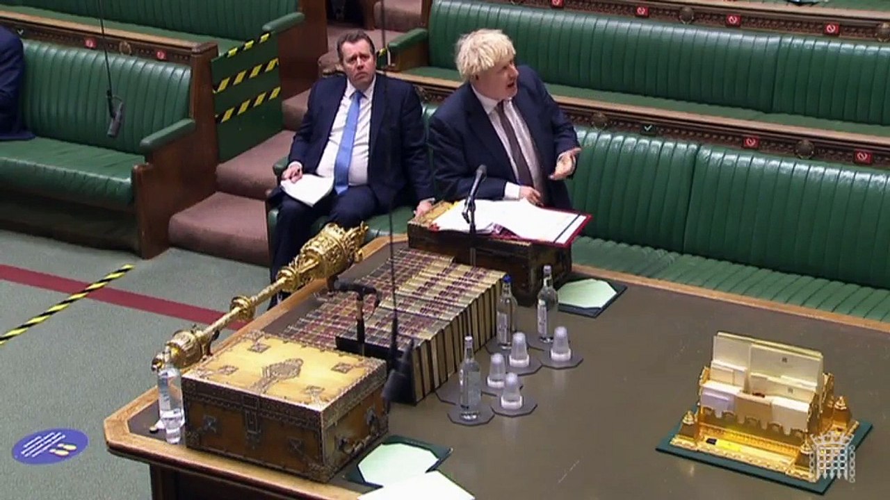 Boris Johnson defends Christmas easing of Covid rules after Keir Starmer accuses him of making the 'next big mistake'