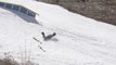 Skier's Skis Fall Out on Snowy Slope After Failed Attempt at Skiing Over Rail
