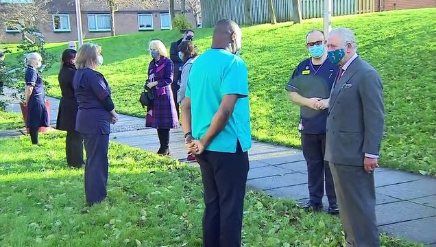 Prince Charles and Camilla visit Covid vaccination centre