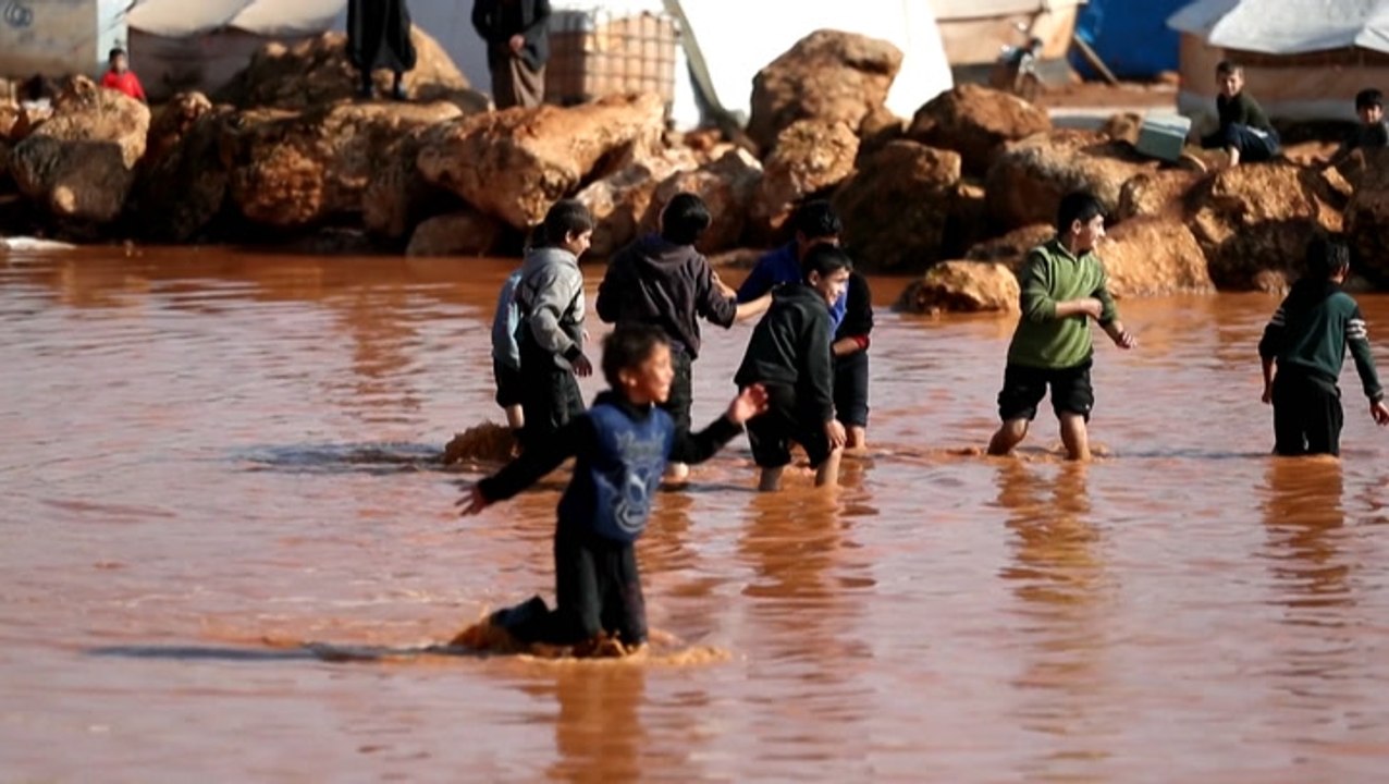 Winter rains flood camp for displaced in Syria