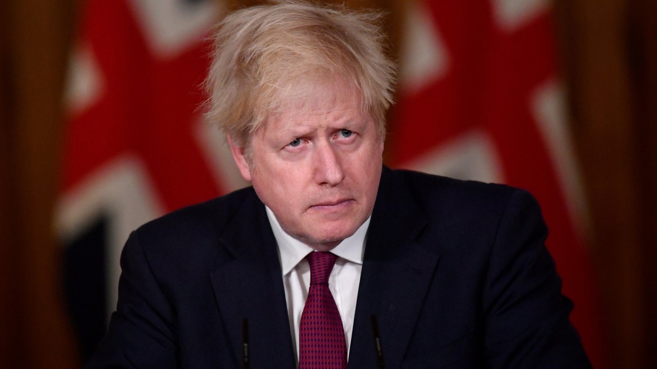 UK imposes tighter curbs amid confirmation of new COVID strain