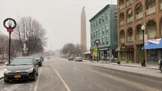 Snow flurries fly around in New York