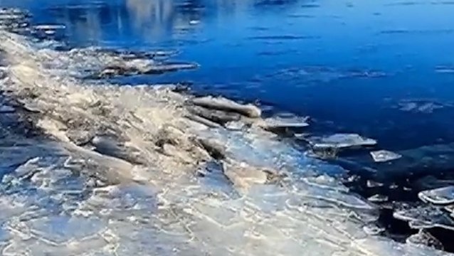 Ice crashes together along lakeshore