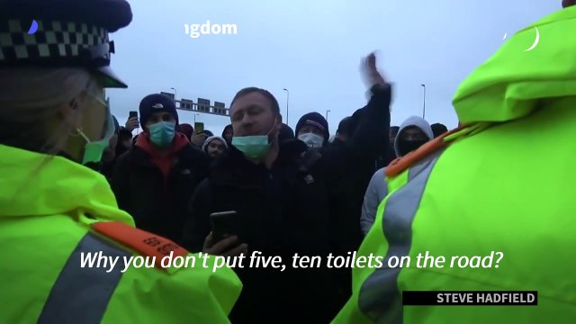 Angry lorry drivers confront police officers at Dover port