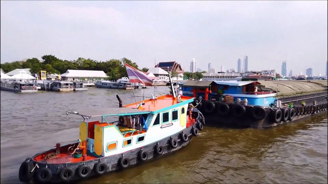 Travel along Chao Phraya river with Tourist Boat in Bangkok