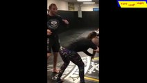 Humorous UFC trainer tries  to give a serious tutorial in footwork grappling