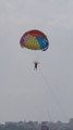 My friend (Pradeep) enjoying paragliding at Coral Island | Koh Larn | Ko Lan | Pattaya | Thailand | Jordan Oza