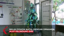 Nakes di Manado Hias Pohon Natal Berornamen APD