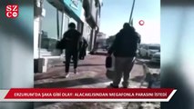 Alacaklısından megafonla parasını istedi, görenler hayrete düştü