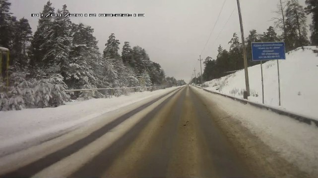 Overtaking Car Slides Into Oncoming Traffic Head-On