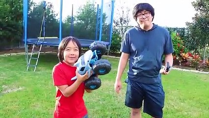 Ryan plays with Monster Truck Car that walks on Water