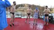 Hardy swimmers take a Christmas dip in Prague's Vlata river