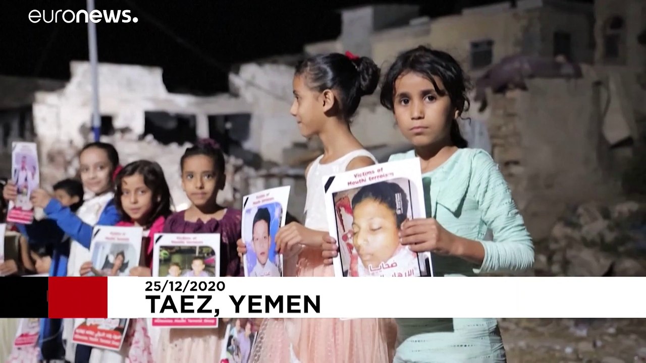 Yemenis light candles on Christmas Day to draw attention to continued crisis