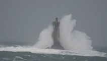 Storm Bella brings huge waves and flooding to UK