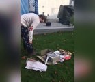 Guy Struggles to Unwrap His Christmas Gift Covered in Concrete
