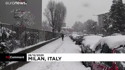 Heavy snow coats Milan in white but disrupts city traffic