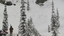Guy Tumbles Downhill While Skiing on Rocky Edges of Mountain