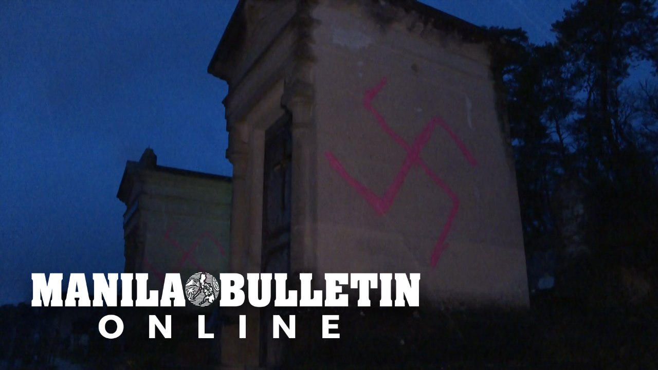Dozens of French graves defaced with swastikas