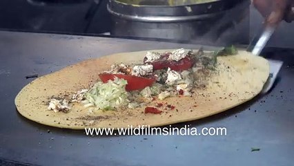 Paneer Chilla or spicy cheese pancake preparation _ Pancakes in India