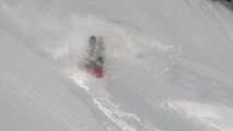 Skier Attempts to Jump From Snow-Covered Edge of Mountain and Crashes