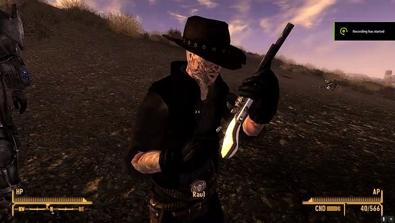 Ghoul Gunslinger furiously reloads gun holding unprecedented amounts of bullets while a asocial doctor watches astonished as all that he knew of the world falls to pieces around him