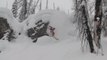 Guy On Skis Falls Through Huge Mound Of Snow And Rolls Down Hill