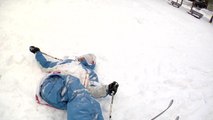 Guy Crashes on Snowy Ground While Attempting to Jump Over Ledge While Skiing