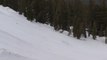 Skier Jumps Off Snow-Ramp and Slides Down Slope After Crashing