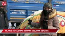 Atlarını battaniyeye sararak dondurucu soğuklardan koruyorlar