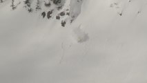 Skier Tumbles Into Snow After Jumping Off Snowy Mountain