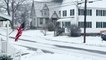 Snow falls in Maine as storm moves out of the Northeast