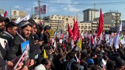 Iraqi and Lebanese Shiites mourn commanders killed by US a year ago