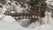 Guy Crashes On His Back While Skiing On Handrails Of Bridge