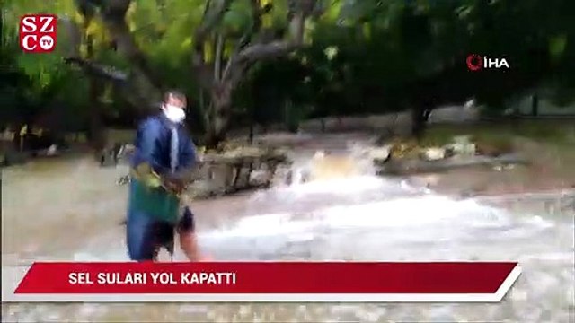 Yollar suyla doldu, evine demir parmaklıklardan atlayarak girdi