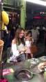 Turkish Ice Cream Vendor Plays Tricks While Handing Ice Cream Cone to Woman