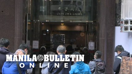 Hong Kong: Scene outside law firm where US solicitor among those arrested on security charge