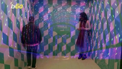 This  Museum Lets You Walk Into a Pool Without Getting Wet