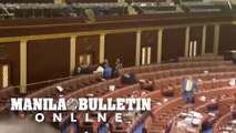 Scene inside Senate and House Chambers as protesters storm the Capitol