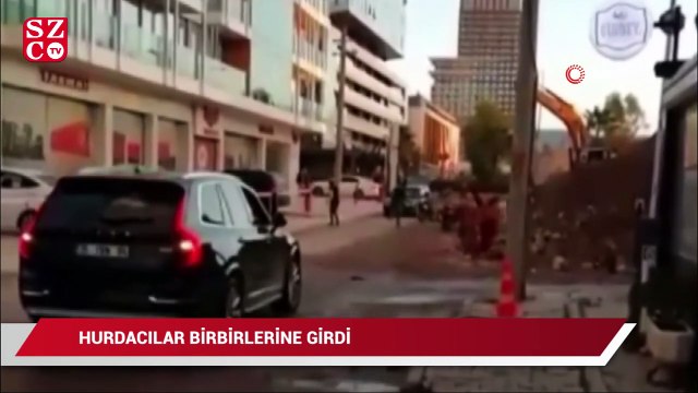 Yıkılan binaların demirlerini toplayan hurdacılar birbirlerine girdi
