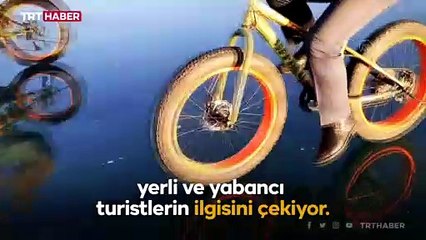 Buzla kaplı Çıldır Gölü'nde bisiklet turu