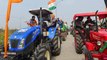 Protesting farmers take out tractor march against farm laws | Watch