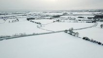 Snow blankets the English countryside