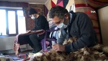 Yıpranmış antika halılara Türk neşteri