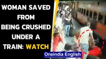 RPF personnel save woman from being run over by a train, mishap averted: watch| Oneindia News