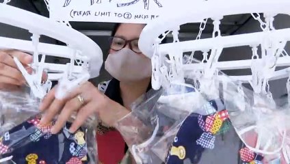 Queensland woman sewing free masks for local community