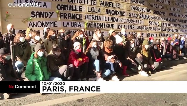 Names of 111 women killed in domestic violence in 2020 pasted on walls in Paris protest