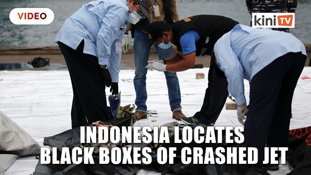 Indonesia locates black boxes of crashed jet as body parts recovered