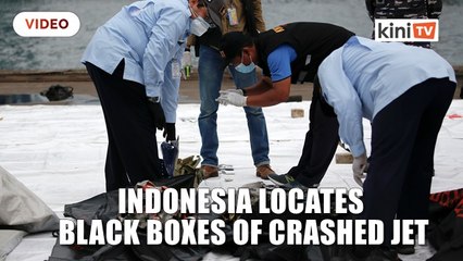 Indonesia locates black boxes of crashed jet as body parts recovered