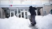 City residents clear hospital entrances after snow