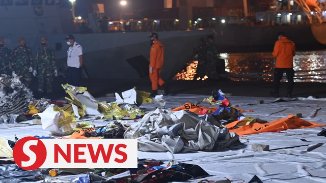 Indonesia steps up search for plane crash victims, 'black box'
